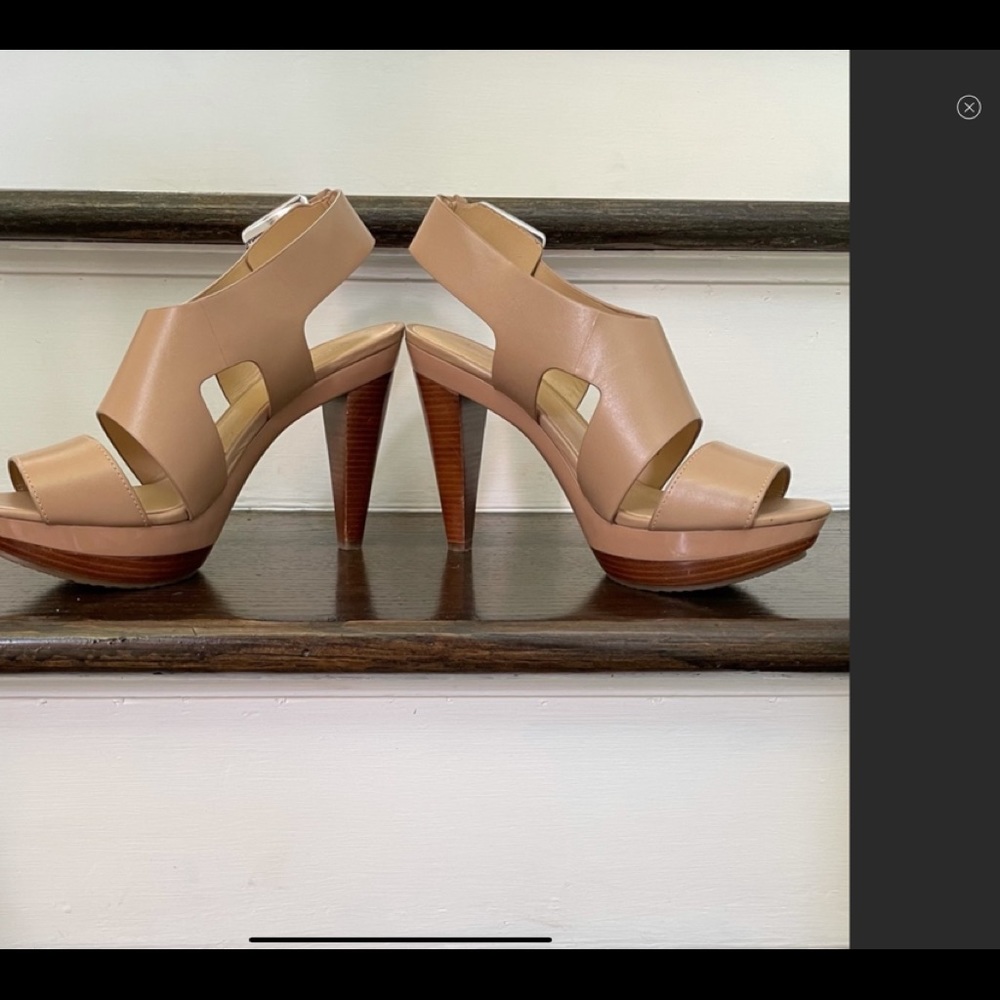 Micheal Kors! Very cute!! Run a little big! My lose your gain!!  Like Brand New